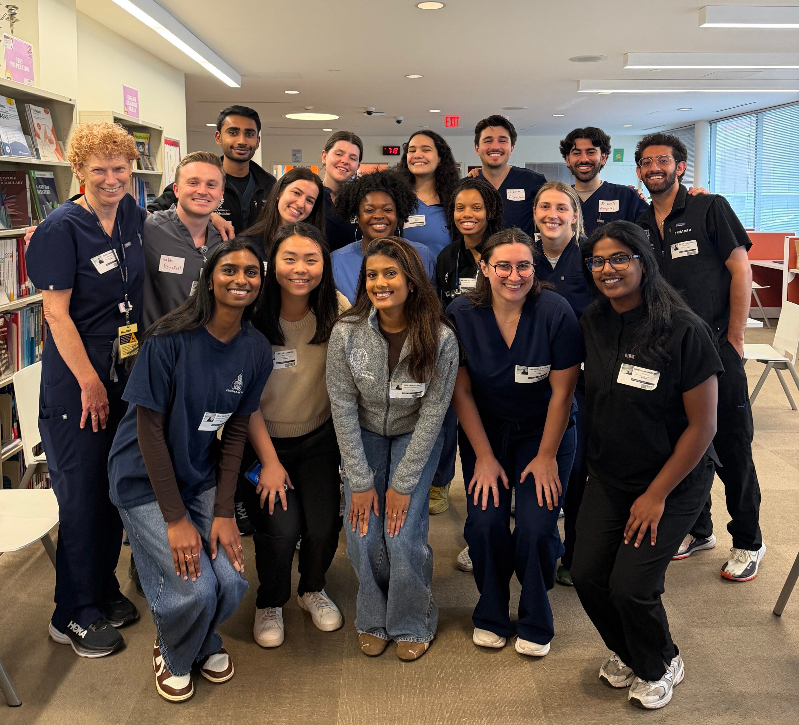 photo of volunteers smiling in a group after health fair at carlos rosario